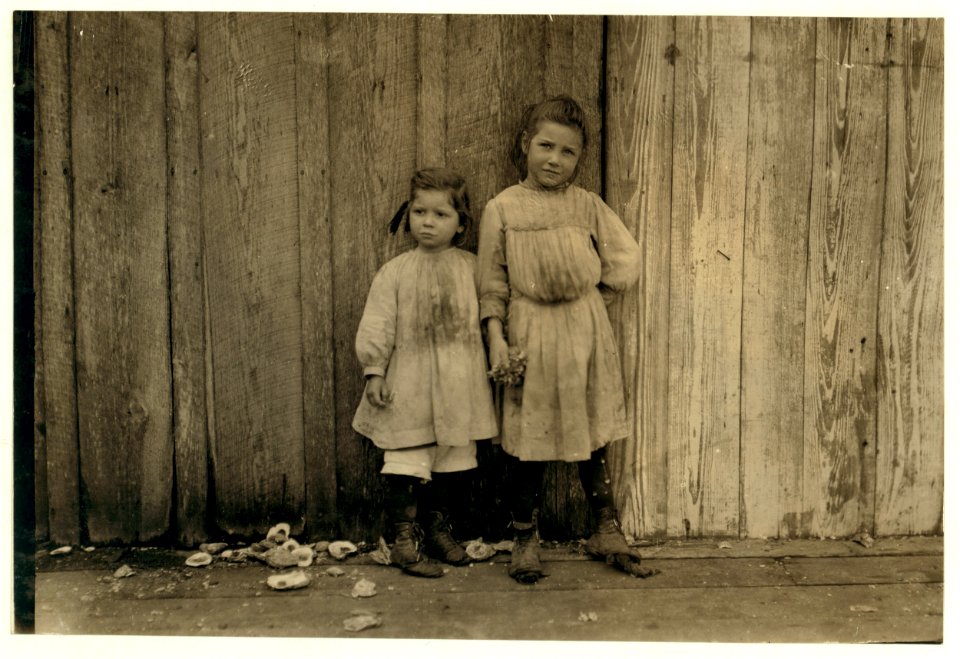 Maud Daly, five years old. Grace Daly, three years old. Pick shrimp at the Peerless Oyster Co. Their mother said they both help. Their sister said the little one was the fastest. Many other LOC nclc.00893