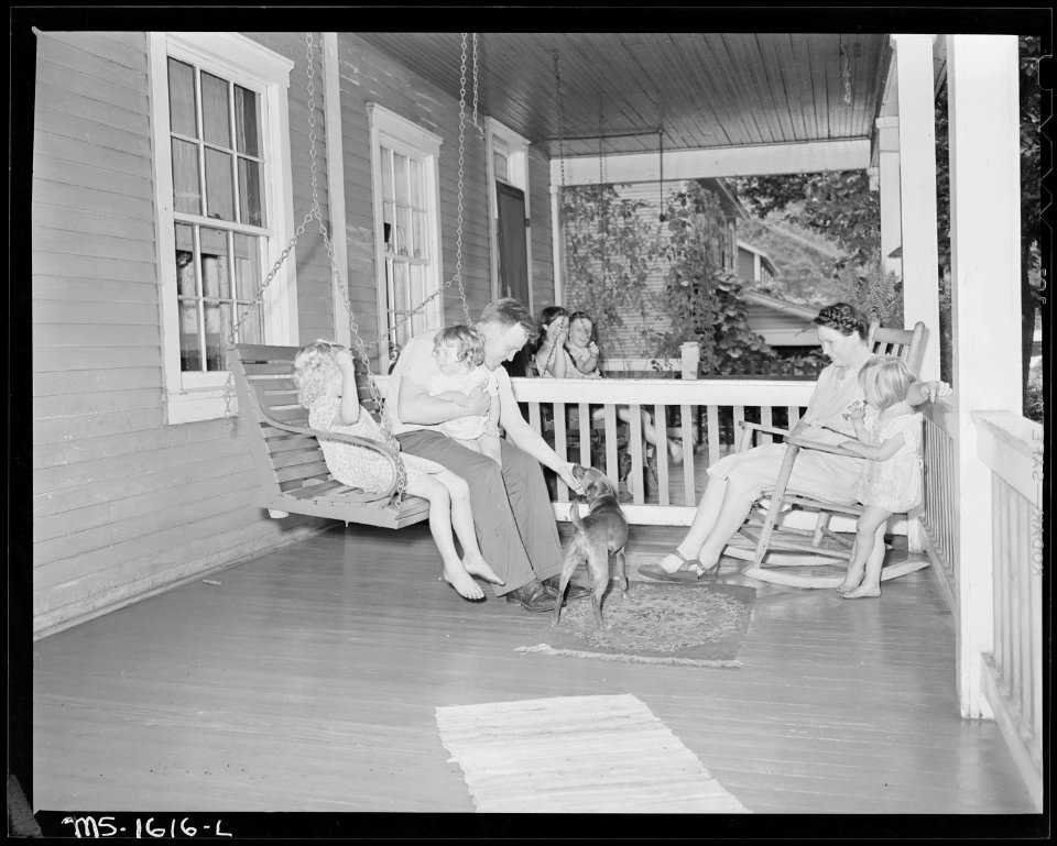 Mr. and Mrs. E. R. Kunz and their three daughters on the front porch of their house. U.S. Coal and Coke Company, Gary... - NARA - 540880