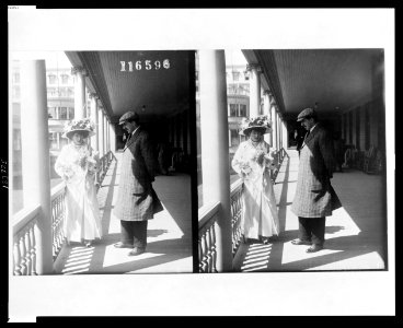 Mr. and Mrs. Edward Beale McLean, standing on a porch, full-length LCCN99471565