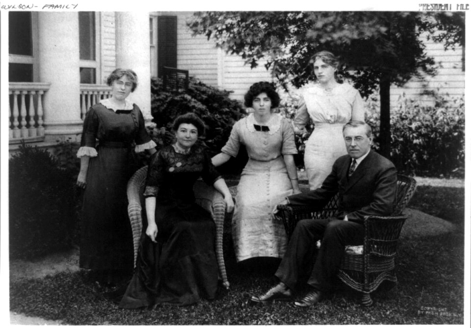 Mr. and Mrs. Woodrow Wilson seated on lawn with their three daughters (left to right) Margaret, Eleanor, and Jessie, in Cornish, New Hampshire LCCN2002716608