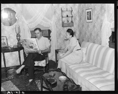 Mr. Doy Edwards, miner, and wife in home of company housing project. Christopher Coal Company, Christopher ^3 Mine... - NARA - 540238 photo