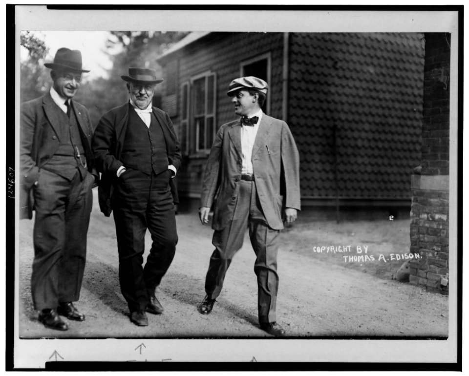 Mr. Thomas Edison walking in laboratory yard with Messrs. Miller Reese Hutchinson and Miller LCCN99472660