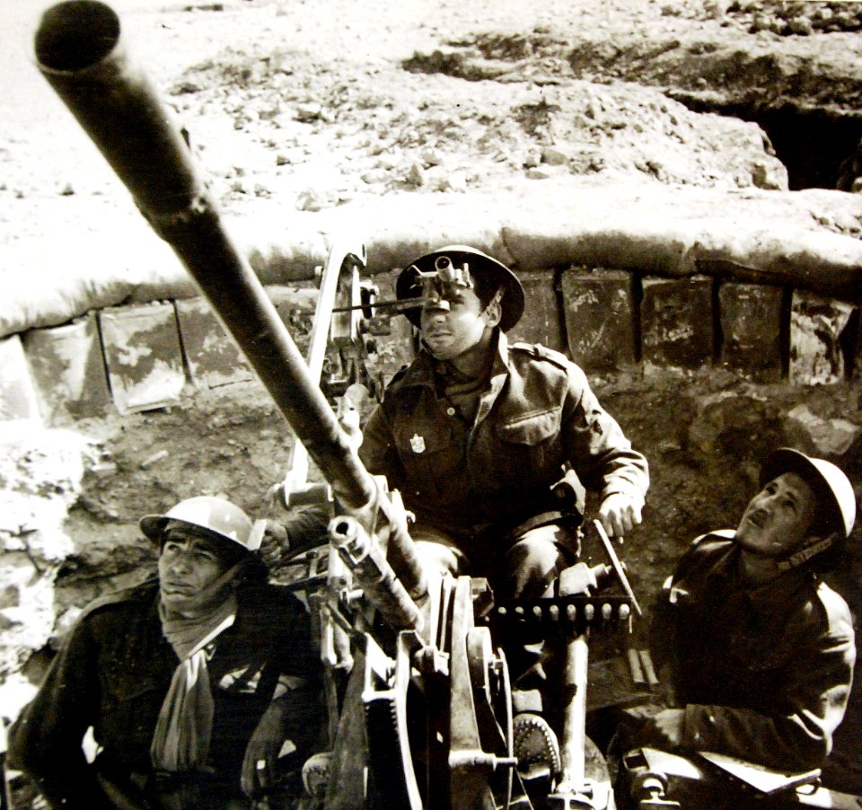 May 1942, a Free French anti-aircraft crew are using a captured Italian Breda 20mm. anti-aircraft gun
