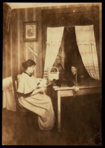 Mrs. Abrams, 15 E. 118th St., N.Y. (ground floor). Makes hair-puffs and switches in her parlor. Dresses hair also. The neighbors, in dark inner bed-room, converse as she works. Husband LOC nclc.04196