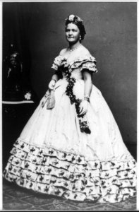 Mrs. Abraham Lincoln, full-length portrait, standing, facing left, near table LCCN96525581
