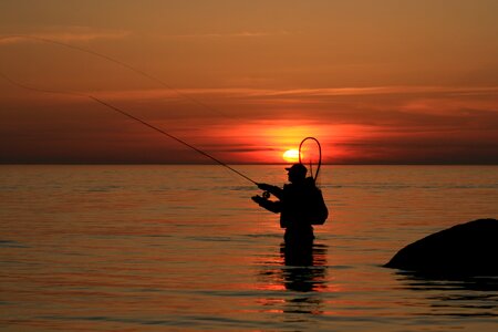 Fishing rod sea catch fish photo