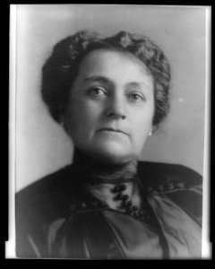 Mrs. Benjamin Harrison, three-quarters length portrait, seated, facing slightly left LCCN96525600