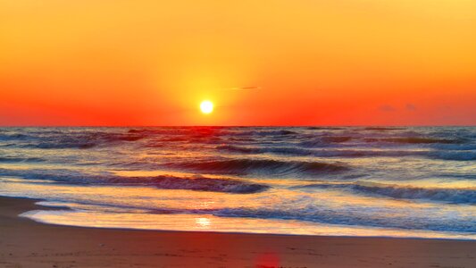 Water waves sunset photo