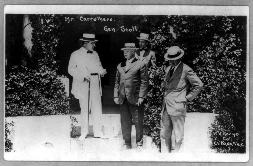 Mr. Carrothers and General Scott standing in a garden with two other men LCCN2005691633
