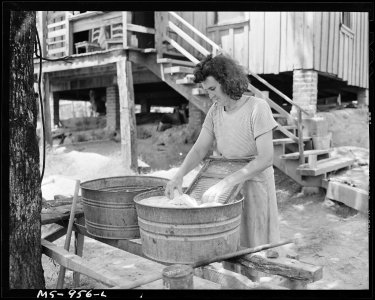 Mrs. Carlos Wilson, wife of miner, washing clothes. Consolidated Coal Company, Bankhead Mine, Bankhead, Walker... - NARA - 540627