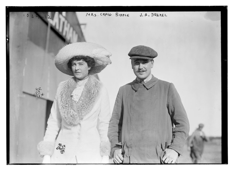 Mrs. Craig Biddle and J.A. Armstrong walking together LCCN2014685337