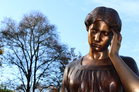 Bronze statue head girl photo