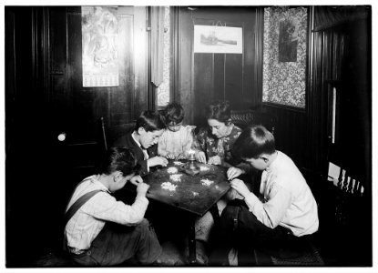 Mrs. Gay, 33 James Street, Attleboro, Mass., and children - 5, 7, 12, and 13 years old, setting stones in cheap jewelry. There were 244 stones in this lot. She said they earned about $5 a LOC nclc.05579