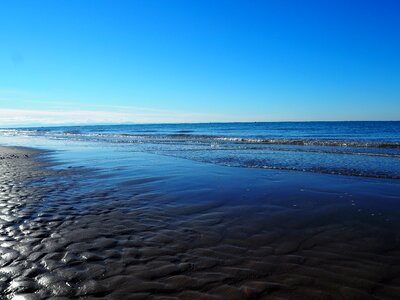 Sunrise sand most beach photo