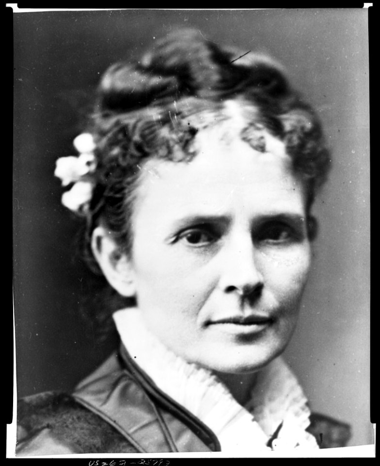 Mrs. James Garfield, three-quarters length portrait, standing, facing slightly right LCCN96525598