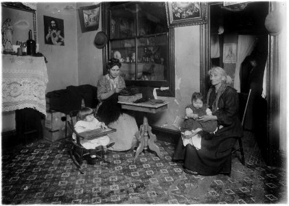 Mrs. Larocca making willow plumes in an unlicenced tenement. Found nine families at work making feathers. When our... - NARA - 523526