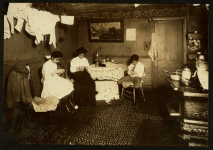 Mrs. Mary George, 74 Southbridge Street, Worcester, Mass. Mother and Aaron, 13 yrs., and Elizabeth 12 yrs old, working on crochet slippers. The children work until 9 or 10-30 P.M. sometimes, LOC nclc.04292