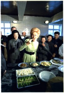 Mrs. Nixon samples cuisine on a visit to the Peking Hotel kitchen - NARA - 194415 photo