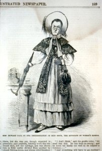 Mrs. Paul Howard in her impersonation of Miss Grym, one of the grimmest specimens of that class of womankind which bore ... with the everlasting subject of woman's rights LCCN2001696537