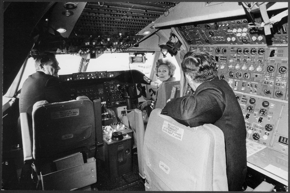 Mrs. Nixon visits the cockpit of the first commercial Boeing 747 jet in conjunction with the christening ceremony for... - NARA - 194665