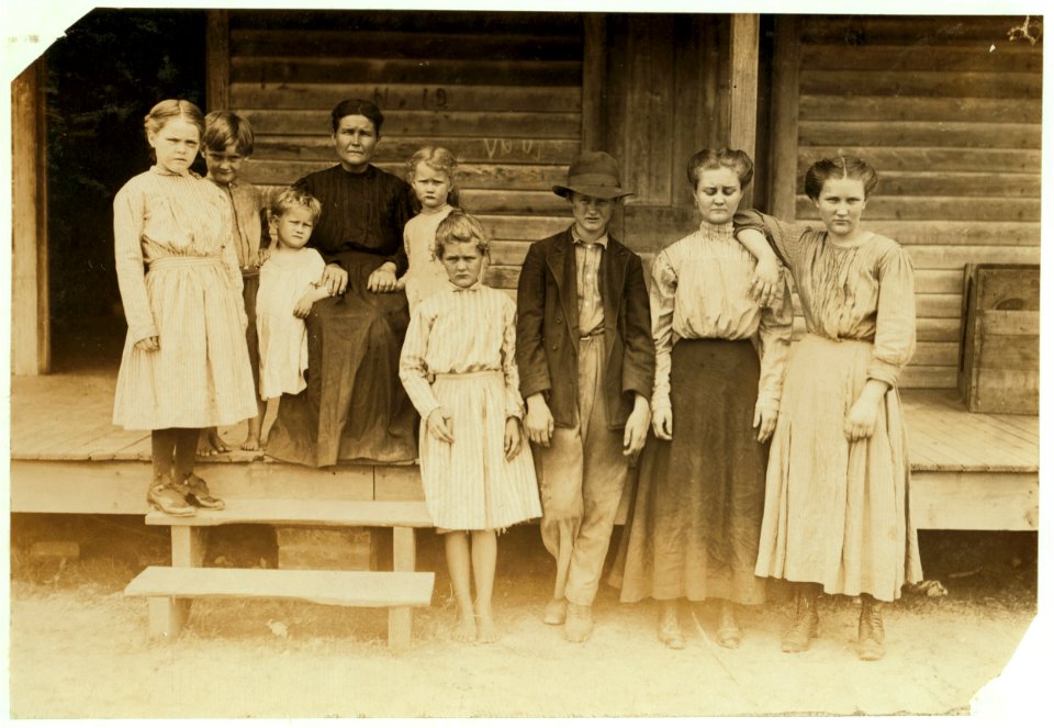 Mrs. Streety (a widow) and family. West Point, Miss. The four children on the ground work in the mill. Oldest makes 90 cents a day, - the next, 70 cents, - the boy 30 cents, ('He's slow,' LOC nclc.02125