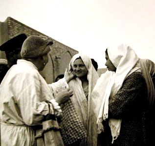 Mrs. Louis Dreyfus, wife of the U.S. Minister to Iran, talking with native girls, WWII (24505536503)