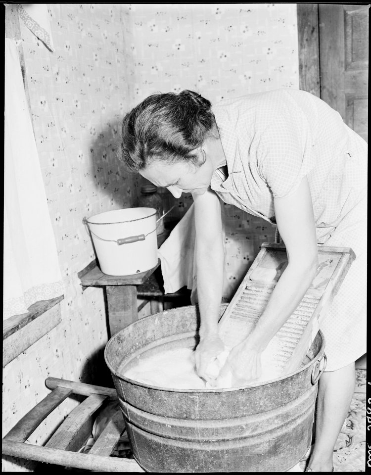 Mrs. Sergent washing. She is a tireless and meticulous housekeeper and her children are always in clean, starched and... - NARA - 541373