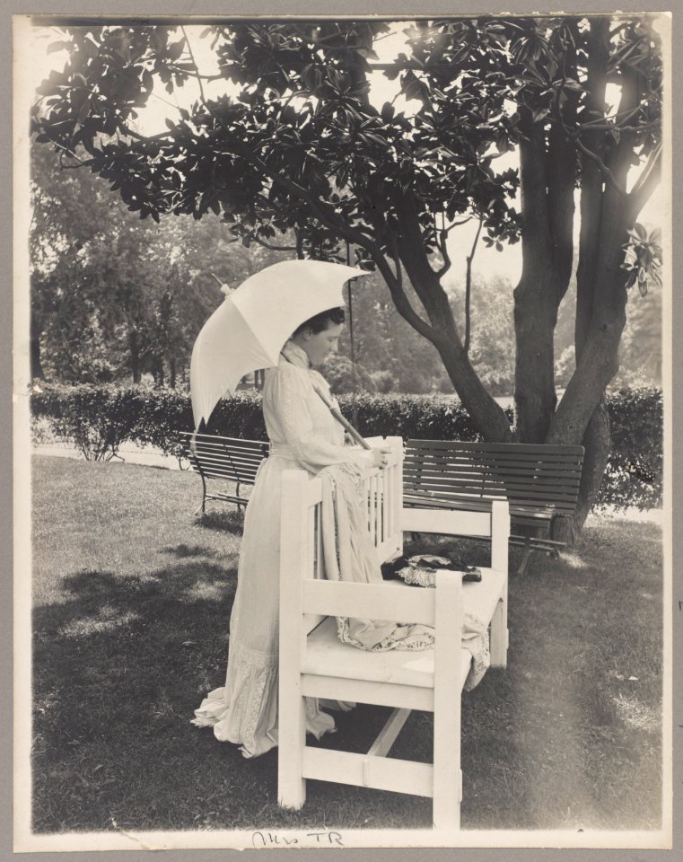Mrs. Theodore Roosevelt, full-length portrait, standing by bench, facing right; holding umbrella LCCN97505488
