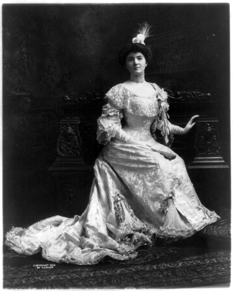 Mrs. Thomas F. Walsh, full-length portrait, seated, wearing long gown, facing left LCCN2006679097
