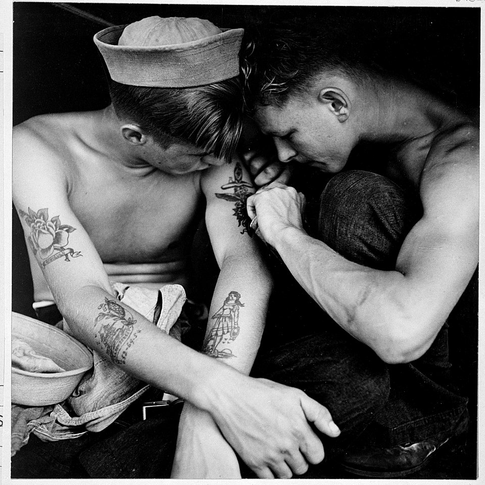 Much tattooed sailor aboard the USS New Jersey - NARA - 520883