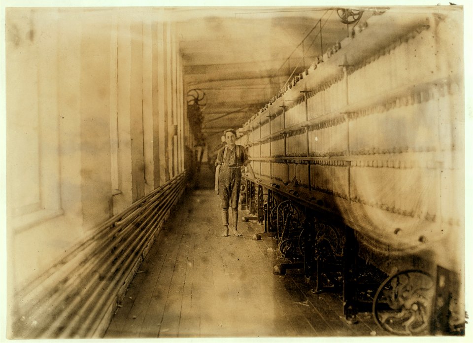 Mule-spinning room, Chace Cotton Mill, Burlington, Vt. Edward Marcotte, a 'back-roping boy' who has been here one year. See also photo and label -730. LOC nclc.01726