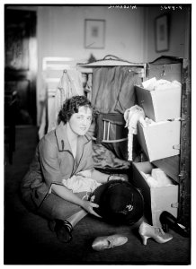 McCormic (seated on floor with clothes and trunk) LCCN2014713872