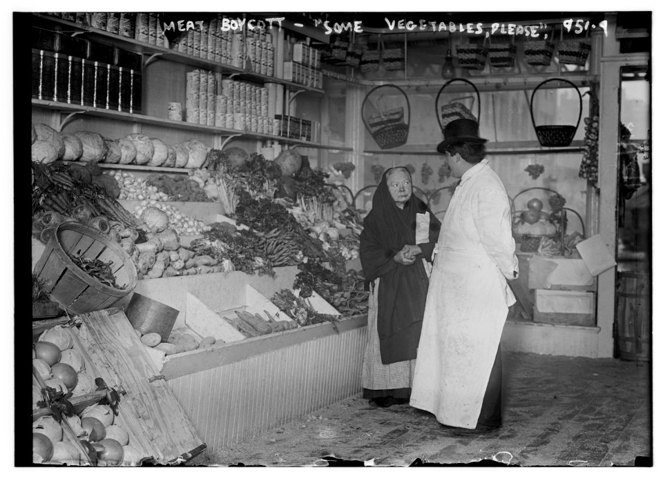 Meat boycott. Some vegetables please. (Woman buying vegetables in NYC market. 28 March 1910), Photo from the Bain News Service LCCN2014684481