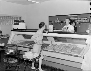 Meat counter in the grocery department of company owned store. Koppers Coal Division, Kopperston Mines, Kopperston... - NARA - 540928
