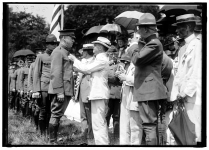 MEDALS, DECORATIONS, ETC. SEC. BAKER DECORATING OFFICERS, JULY 4, 1919. ADM. BENSON IN 30549 AND 30550 LCCN2016870161
