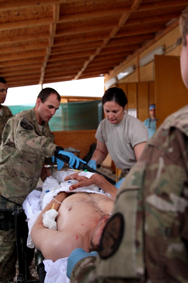 Medical casualty treatment on FOB Farah 121226-N-IE116-050