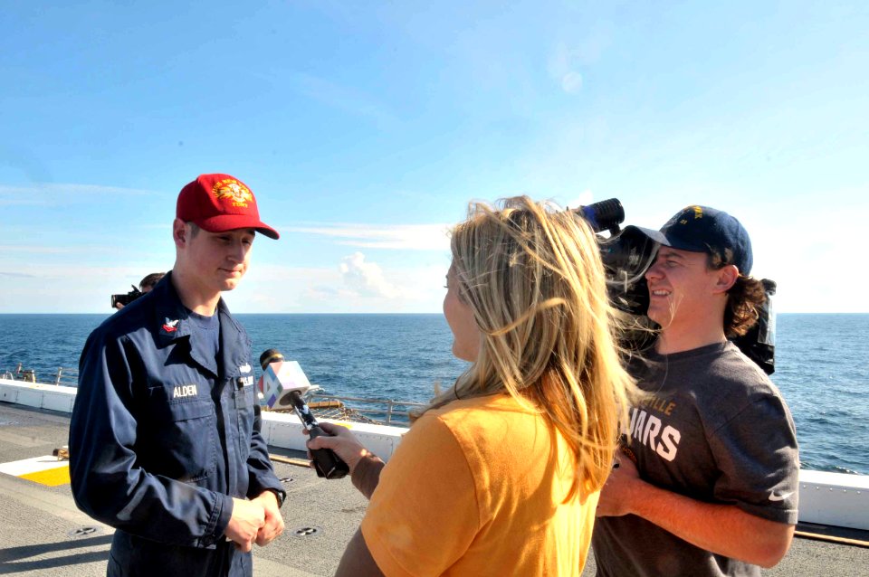 Media cover USS New York move to Mayport 131205-N-GC472-299