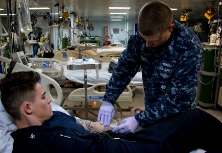 Medical treatment aboard USS Bonhomme Richard (LHD 6) 161115-N-WF272-287