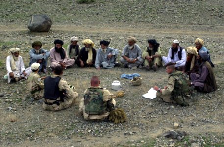 Meeting between US forces and Afghan villagers photo