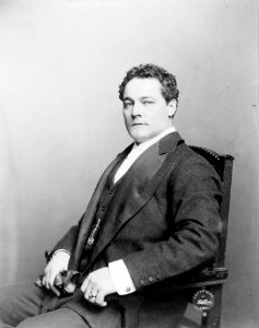 Melbourne Mac Dowel, half-length portrait, seated, facing left LCCN2002695173
