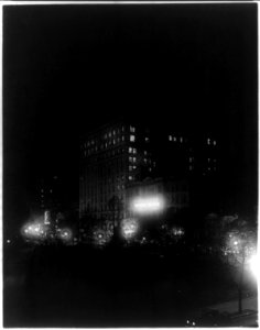 Munsey Building, National Theater and other structures in the 1300 block of E Street N.W., just of Pennsylvania Avenue, Washington, D.C. Illuminated night scene LCCN2004668164