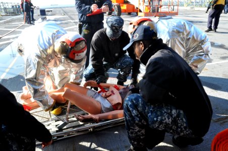 Medical drill aboard USS Arlington 150127-N-GG458-002