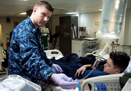 Medical treatment aboard USS Bonhomme Richard (LHD 6) 161115-N-WF272-305