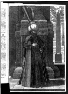 Murad (Amurath) IV, Sultan of the Turks, 1612-1640, full-length portrait, standing, facing right, against building with obelisk at right LCCN90705896