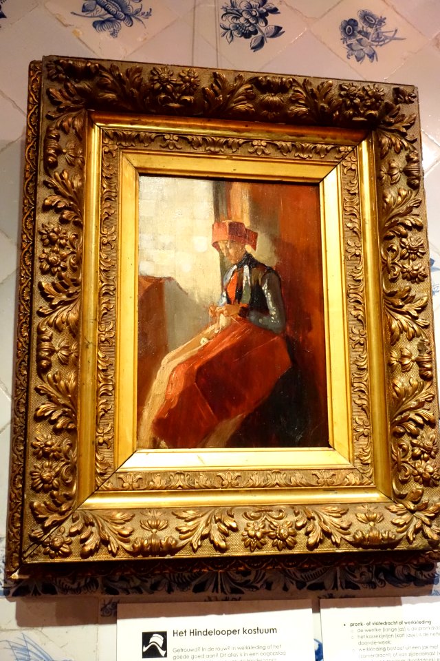 Museum Hindeloopen - Breiend Hindelooper meisje geschilderd door Christoffel Bisschop (1828-1904)