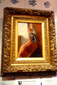 Museum Hindeloopen - Breiend Hindelooper meisje geschilderd door Christoffel Bisschop (1828-1904)