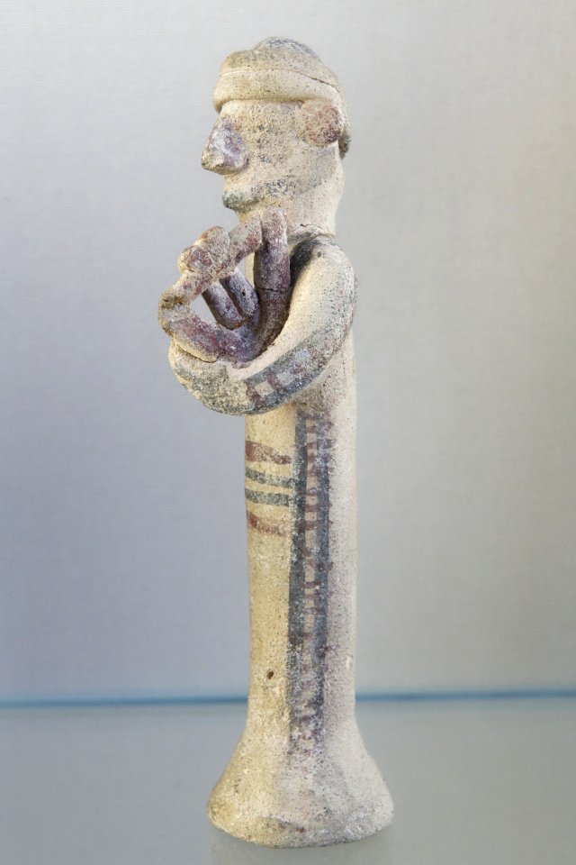 Musician playing the lyre Louvre AM225