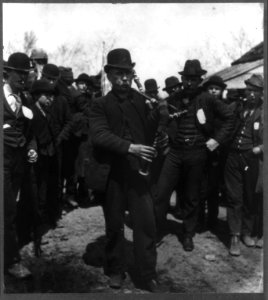 Members of Coxey's Army- men and boys around Little Bobby, the bagpiper who played all the way from Uniontown to Washington LCCN2006681173