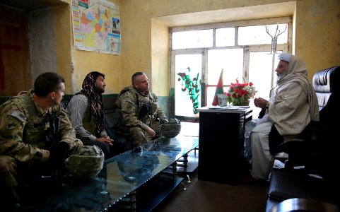 Members of the Farah Provincial Reconstruction Team speaking in Farah City (121229-N-IE116-099 (8338892212))