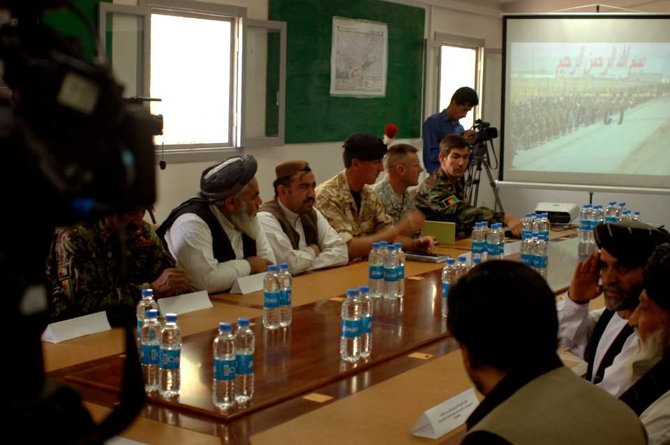 Members of Parliament, various Province Representatives and Consolidated Fielding Center leadership listen to a briefing (4763169227)